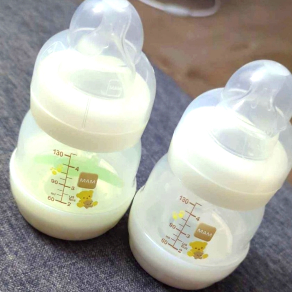 Brand New MAM Anti-Colic Bottles and Pacifiers